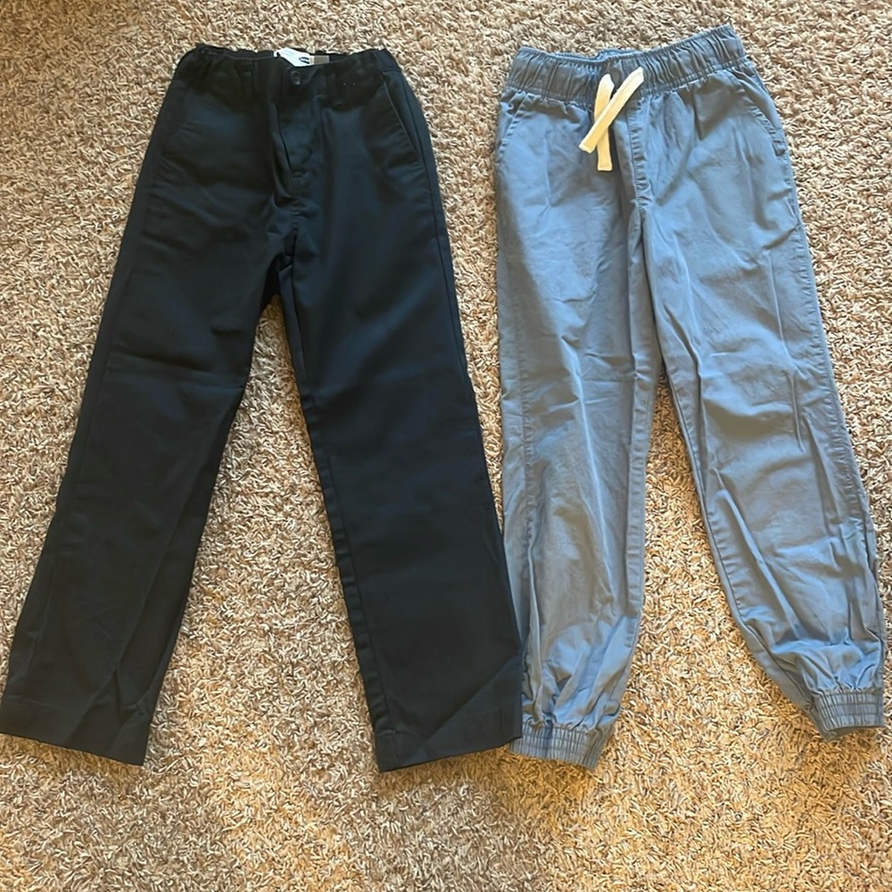 New, never worn. 2 pairs of dress pants - size 7/8